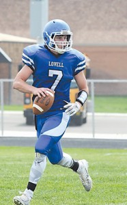 Lovell senior Beau Green rolls out for a pass attempt during an early-season game last fall. Green was recently selected for the Wyoming Shrine Bowl all-star football game. David Peck photo