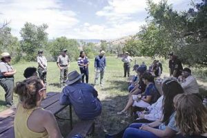 Around 20 community members and influential leaders met with grantors Javiar Torres and Kendra Jenkins from ArtPlace America at the Ewing-Snell Ranch on Friday, to support a grant request to rebuild a historic house on the property that burned to the ground on Dec. 9, 2015. Patti Carpenter photo