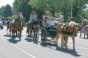 Though not able to ride a horse yet due a recent horse accident, Cowley Rodeo Queen Dacean Thomas appeared in this weekend’s Cowley Pioneer Day parade in a horse drawn carriage surrounded by fellow royalty, family and friends. She also attended the rodeo later that afternoon for a brief period of time, where she mingled with rodeo fans in the stands. Patti Carpenter photo