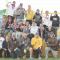 Retiring Rocky Mountain High School track coach Tobee Christiansen (third from right) celebrates with his team moments after clinching the first and only state track championship in school history in 2021. Courtesy Photo