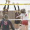 Bailey Gifford and Kaysie Cooley block Burlington’s spike during the Rocky Mountain Invitational. Sherry Snell